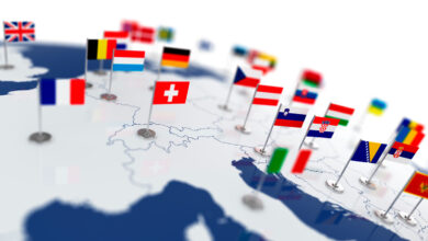 Image of a globe with flags of various countries
