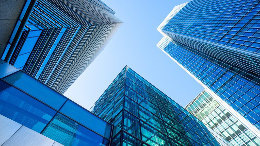 This is an image of a group of skyscrapers with a camera angle looking up to the sky.