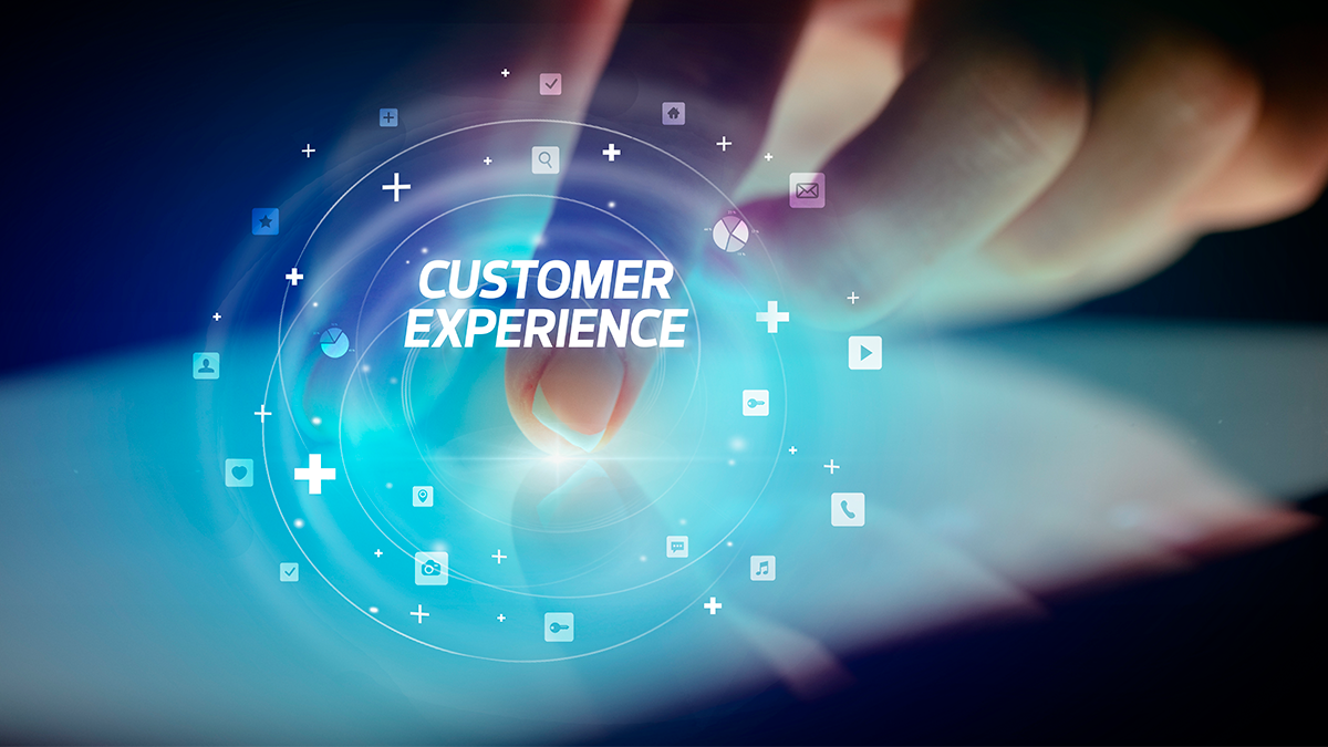 A hand touches a tablet with the words 'customer experience' in the foreground.