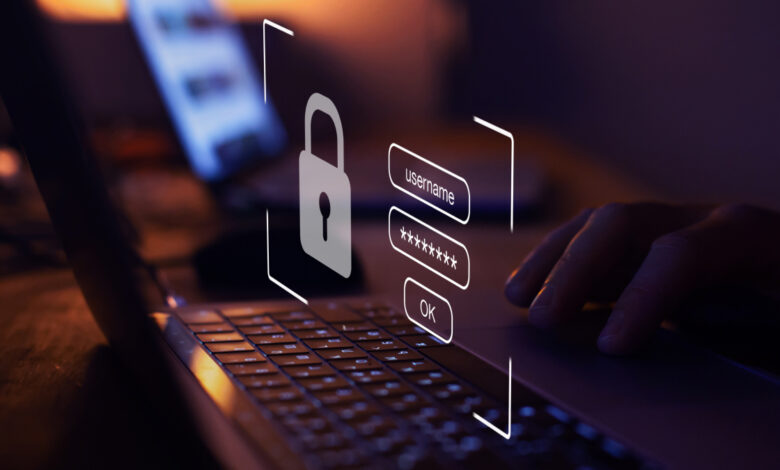 Computer keyboard beneath image of padlock and user sign-in fields.