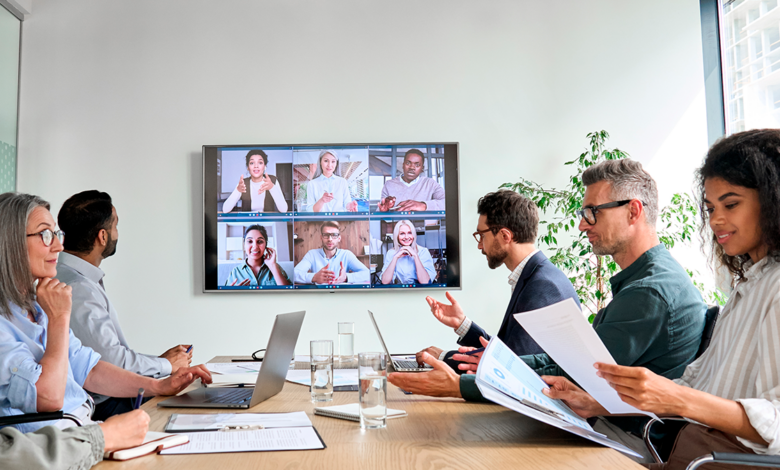 decorative image of people collaborating in a meeting room