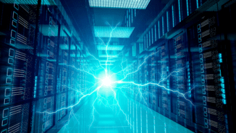 Image showing a corridor of servers lit up by a lightning flash.