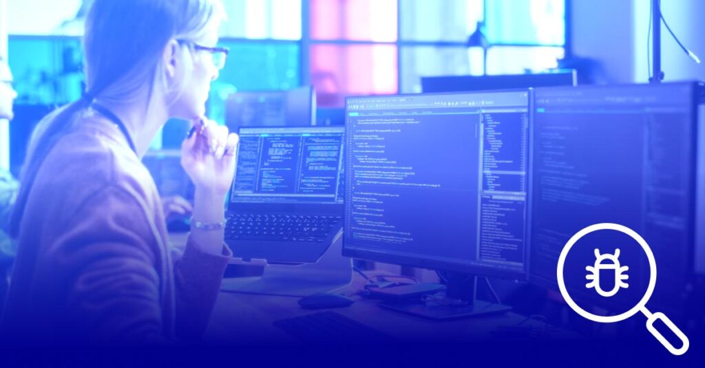 A woman is looking at computer screens with threat reports on them. In the bottom right corner, there is a magnifying glass symbol with a bug inside. Everything except the symbol has a blue overlay.