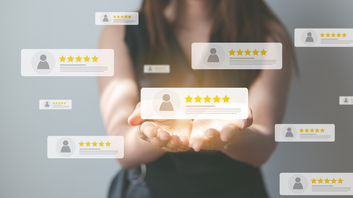 Customer holding five-star icons of positive customer feedback