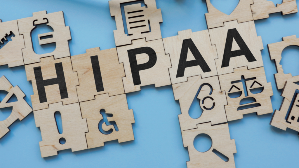 Illustration with tiles that spell out HIPAA as it relates to HIPAA compliant fax.