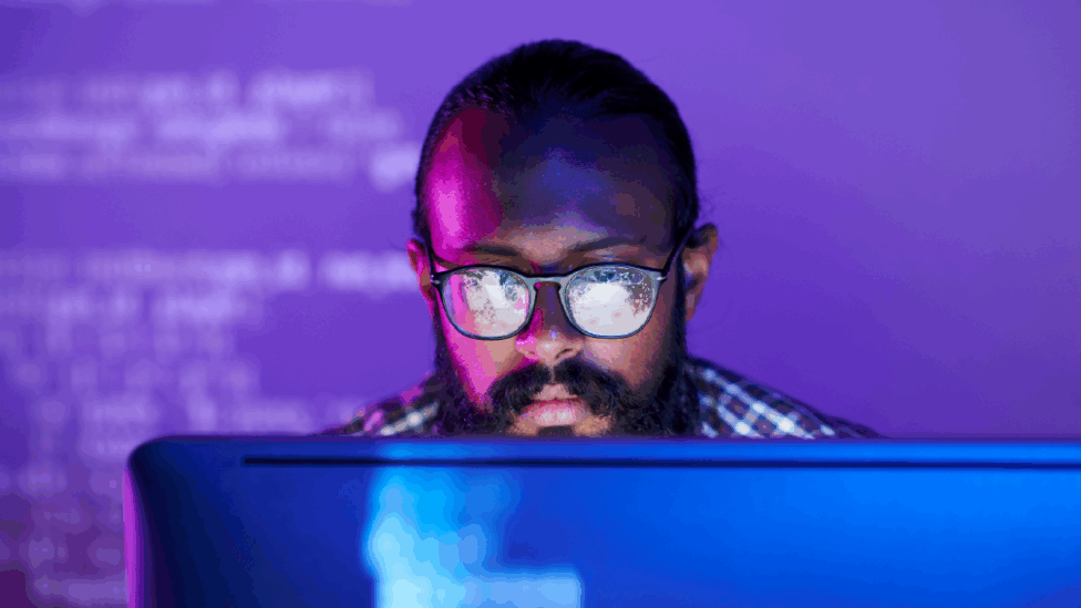 This image represents a devsecops coder at work.
