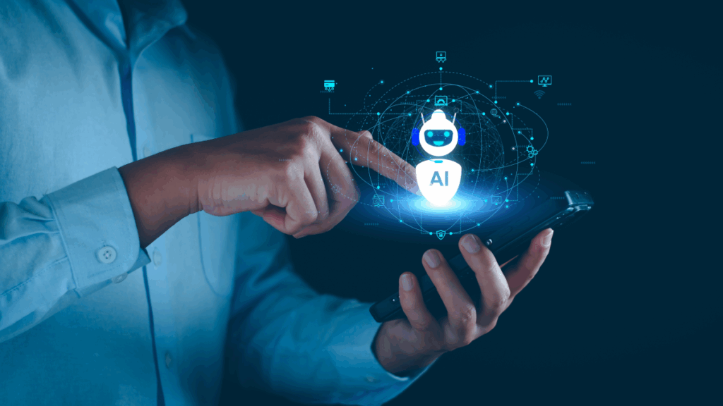 a midshot of a male worker holding a mobile device in one hand and pointing to it,