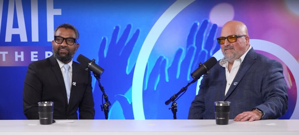 Screenshot from OpenStudio interview featuring Edward Kiledjian with Ajit Yohannan.