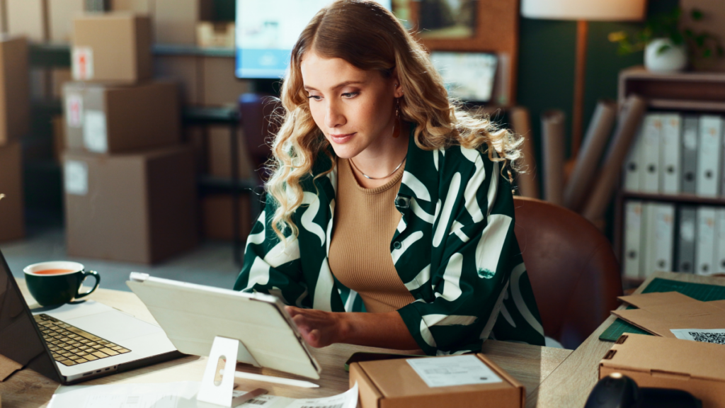 Woman reviewing procurement activity on her computer