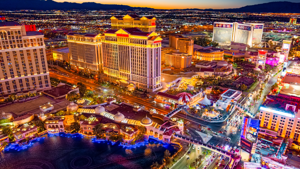 shot of downtown Las Vegas at night with lots of lights, location of Manifest 2026 where they discussed agentic AI for supply chain